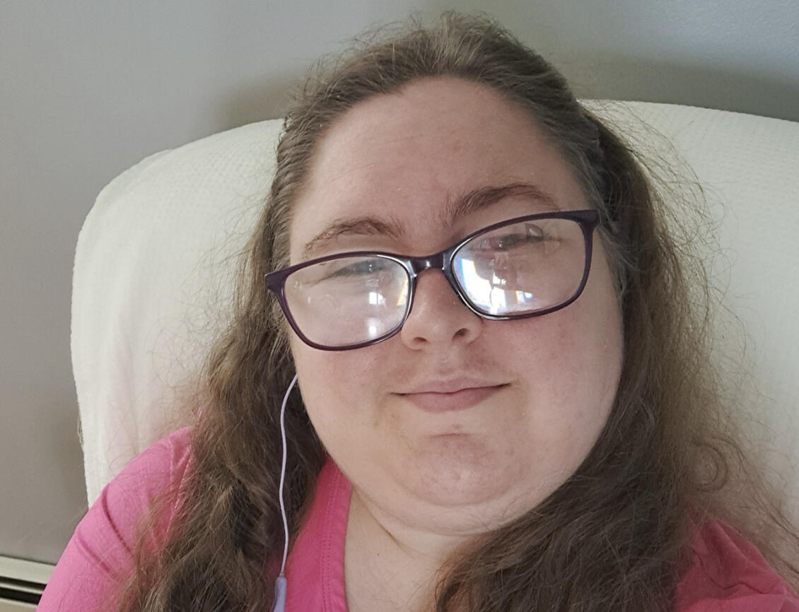 A selfie of the artist who created this carrd page